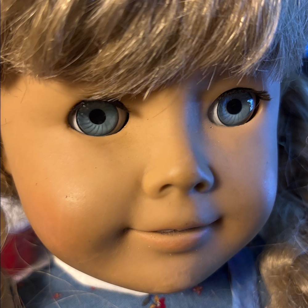 American Girl Doll with Red and Blue Outfit